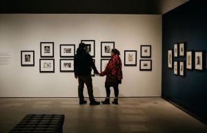 Couple holding hands at Art Gallery
